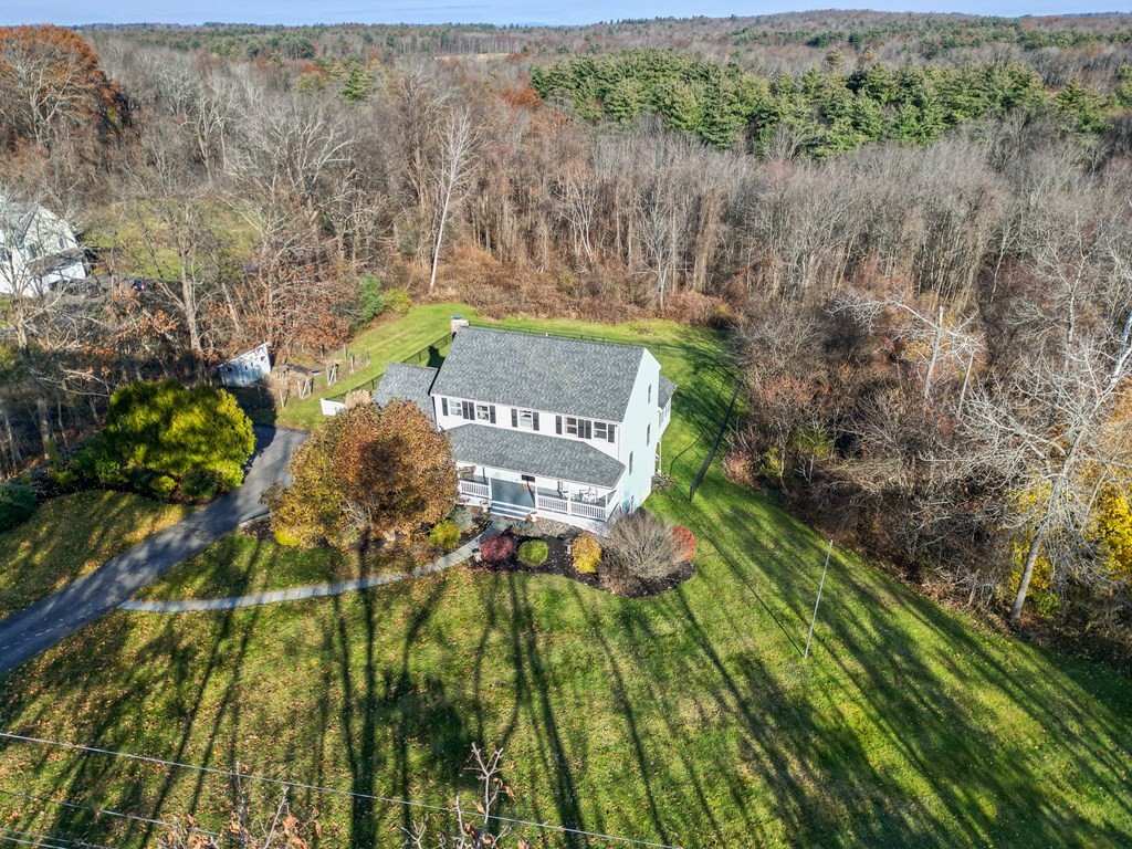 27 Brush Hill Road Merrimac, MA 01860 - Photo 2 of 26 a view of a house with a yard
