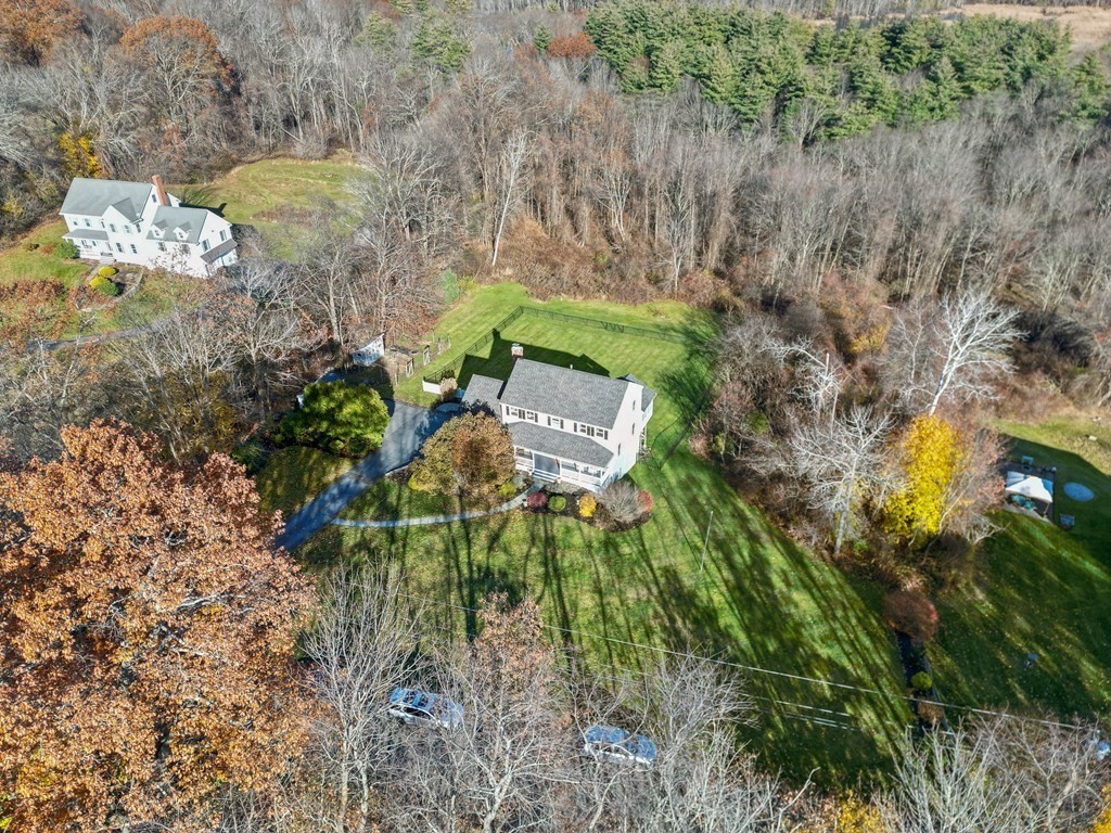 27 Brush Hill Road Merrimac, MA 01860 - Photo 22 of 26 a view of a yard with plants and large trees
