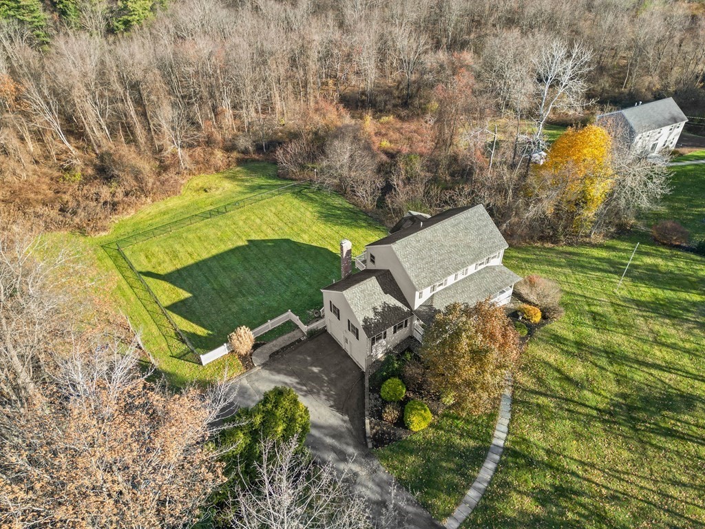 27 Brush Hill Road Merrimac, MA 01860 - Photo 3 of 26 an aerial view of a house with a yard