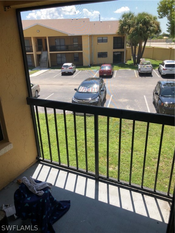 5325 Summerlin Road, Unit 2514 Fort Myers, FL 33919 - Photo 9 of 9 a view of a balcony with furniture