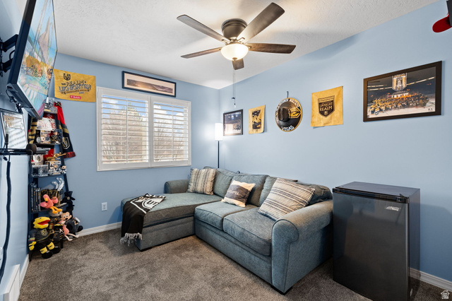 1625 Pages Pl Drive Bountiful, UT 84010 - Photo 19 of 31 Bedroom featuring carpet, ceiling fan, and a textured ceiling