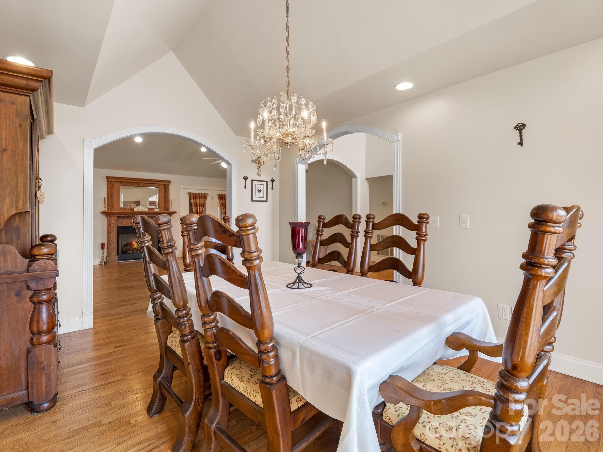 92 Rodaeo Drive Columbus, NC 28722 - Photo 12 of 32 a view of a dining room with furniture and chandelier