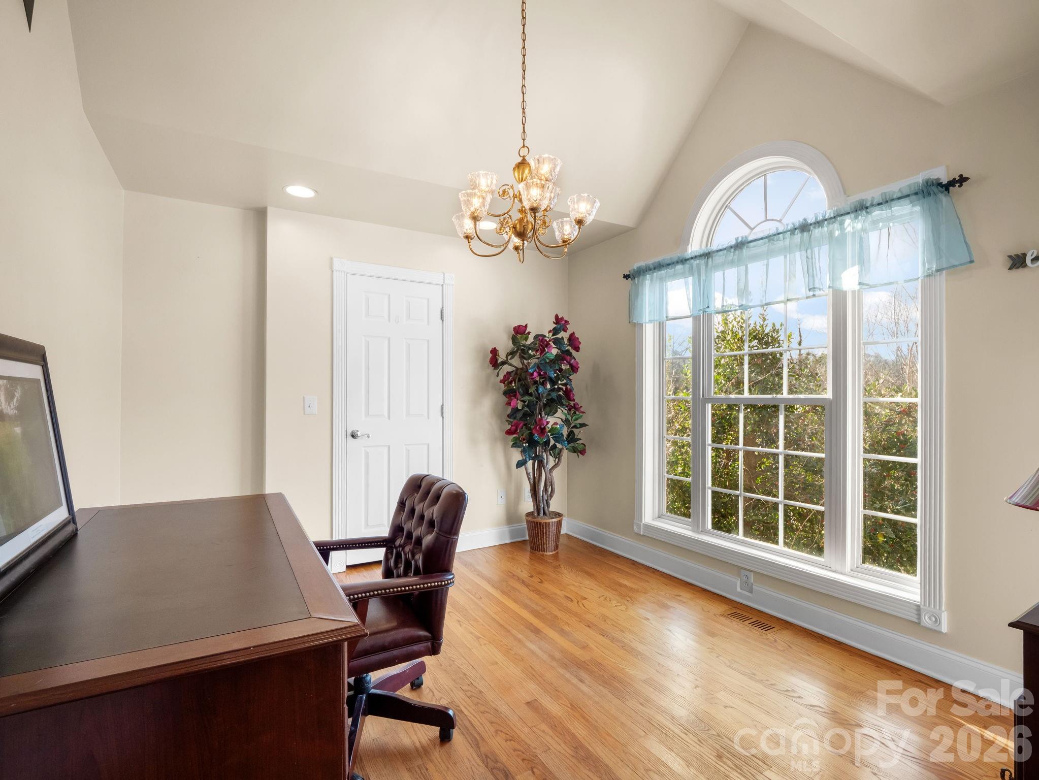 92 Rodaeo Drive Columbus, NC 28722 - Photo 13 of 32 a view of a workspace with furniture and a window