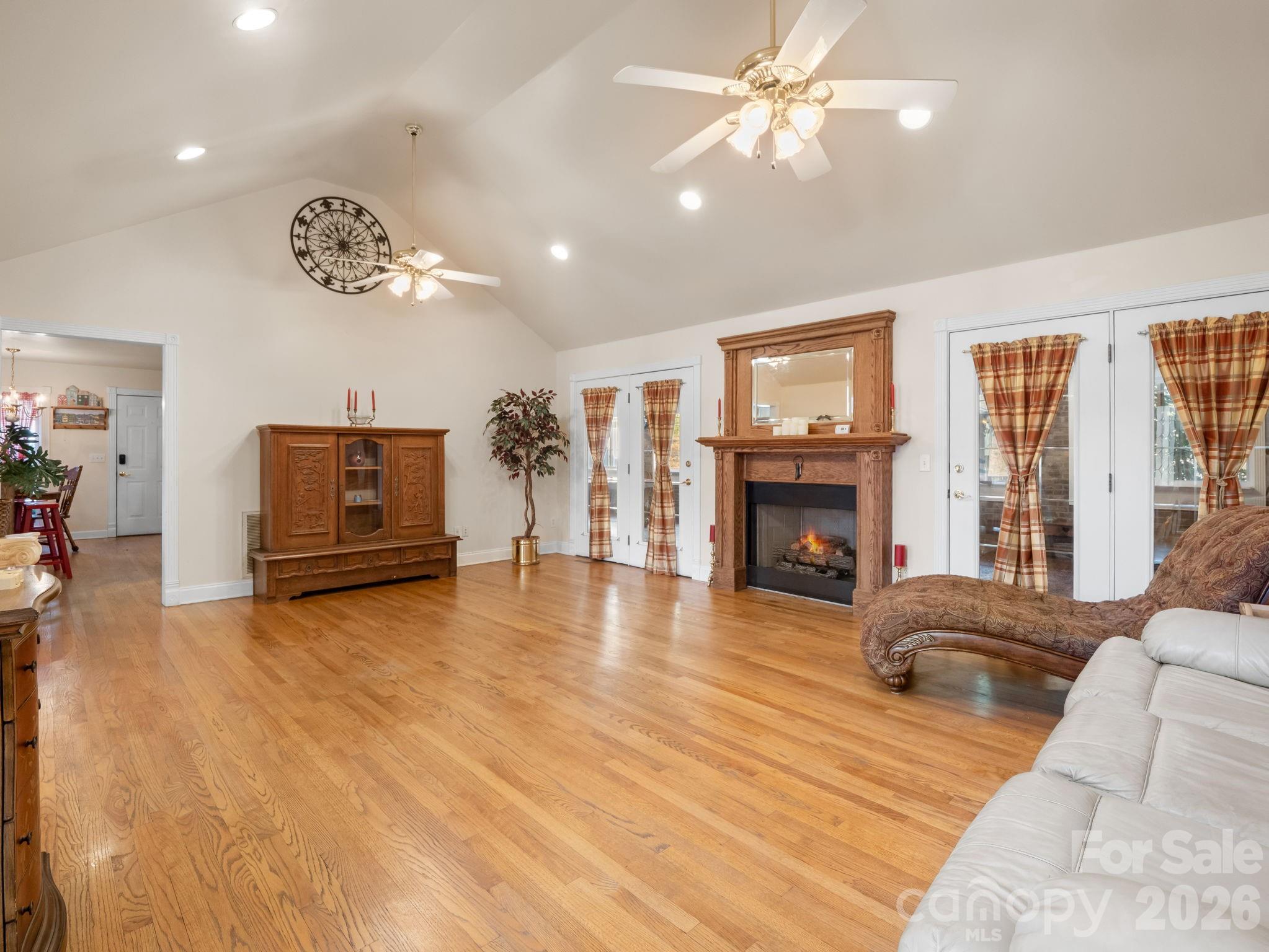 92 Rodaeo Drive Columbus, NC 28722 - Photo 21 of 32 a living room with furniture and a fireplace