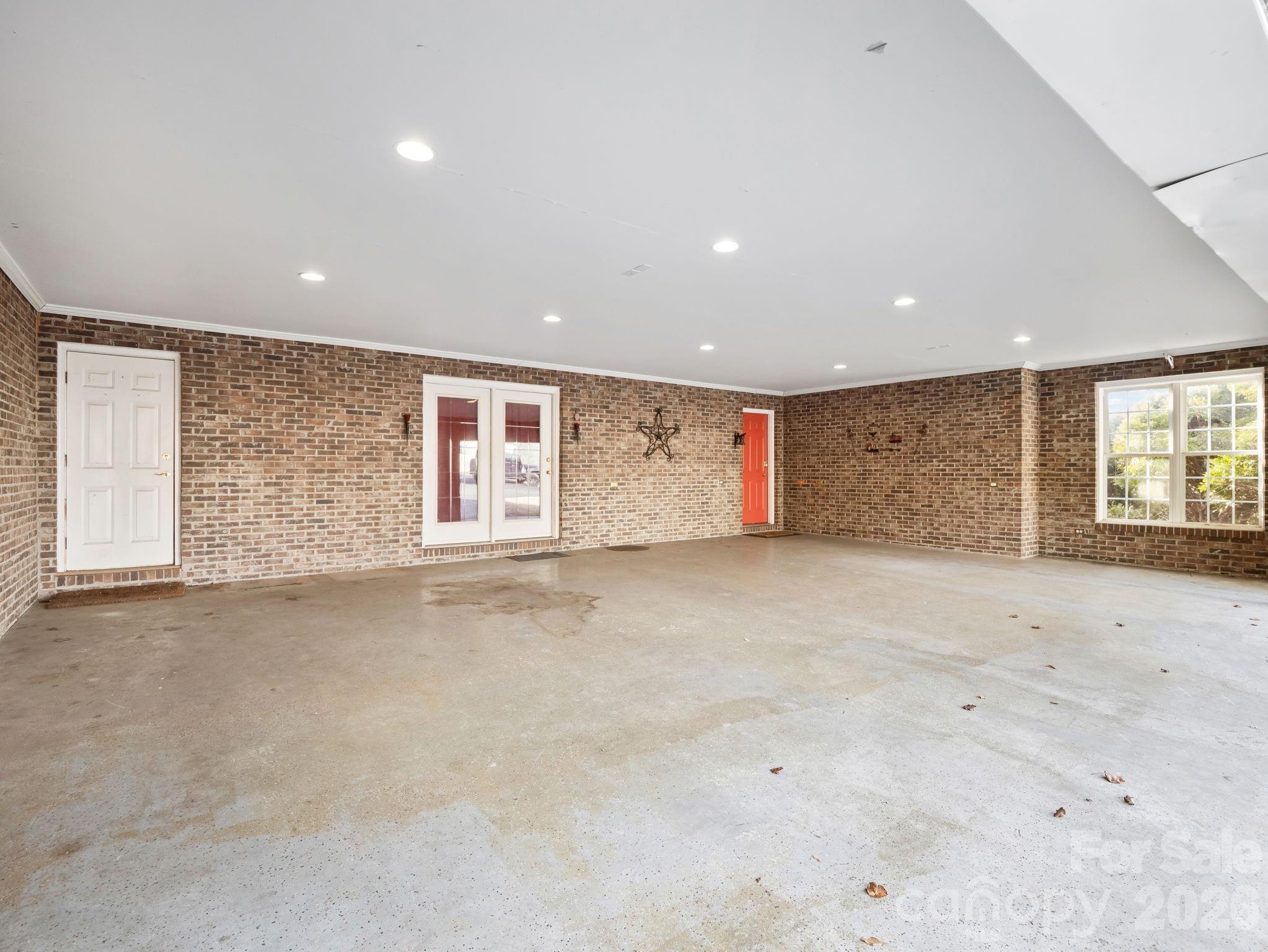 92 Rodaeo Drive Columbus, NC 28722 - Photo 5 of 40 an empty room with windows