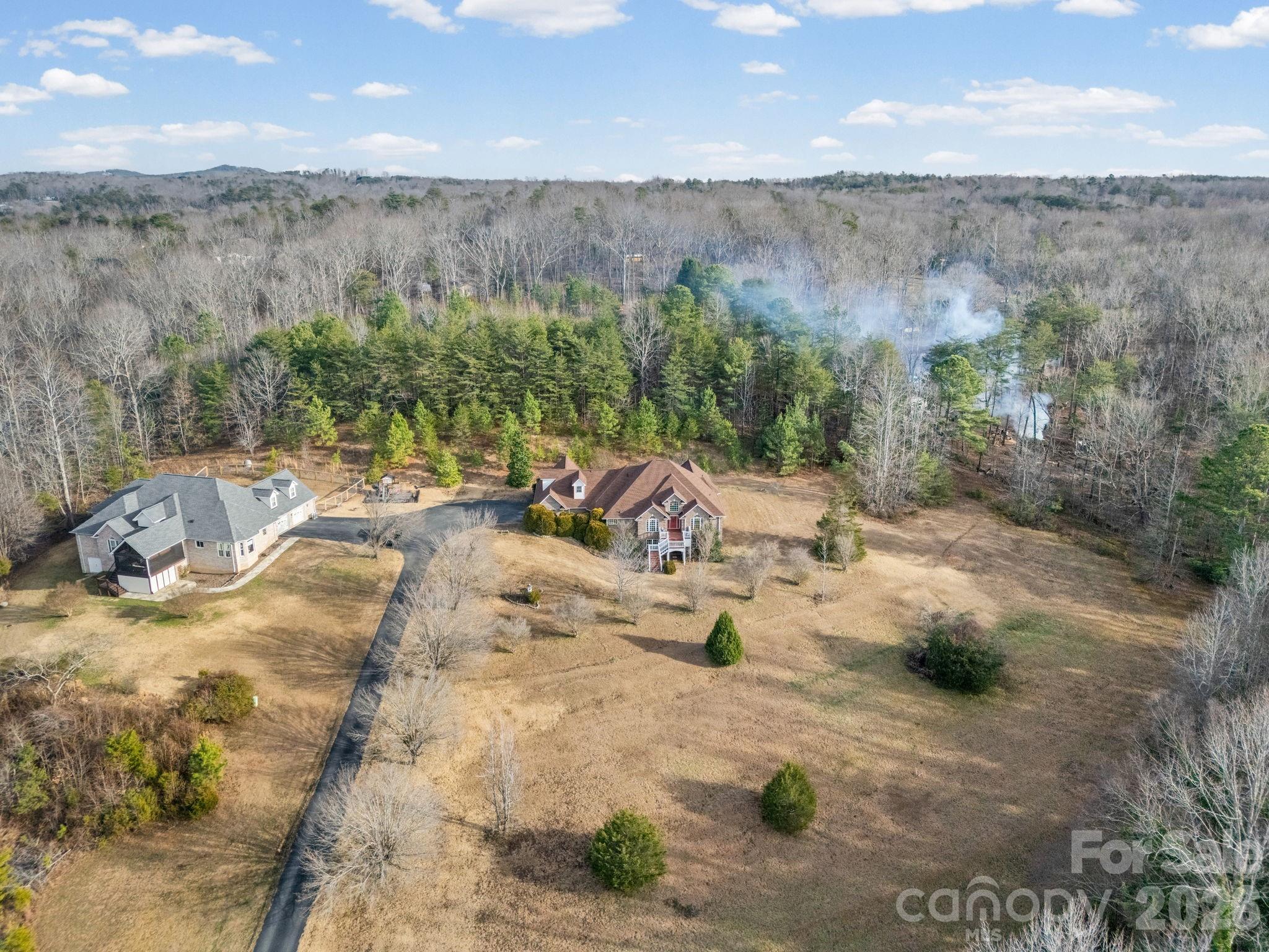 92 Rodaeo Drive Columbus, NC 28722 - Photo 6 of 32 a view of a backyard of a house