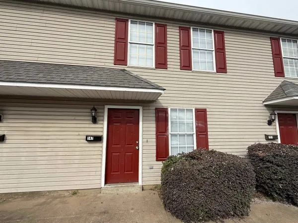 a view of a house with a garage