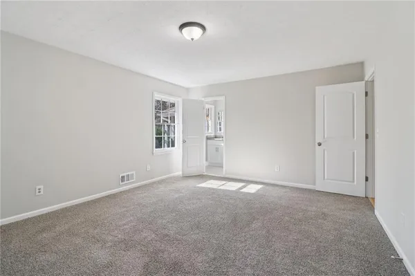 a view of storage and utility room with washer and dryer