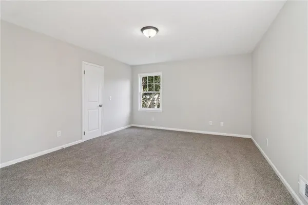 a view of livingroom with hardwood floor and a ceiling fan