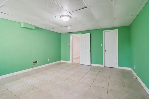 a view of room with wooden floor