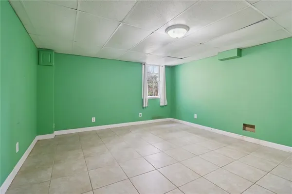 a view of room with wooden floor