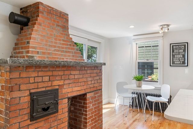 a kitchen with a sink a stove a refrigerator and a refrigerator