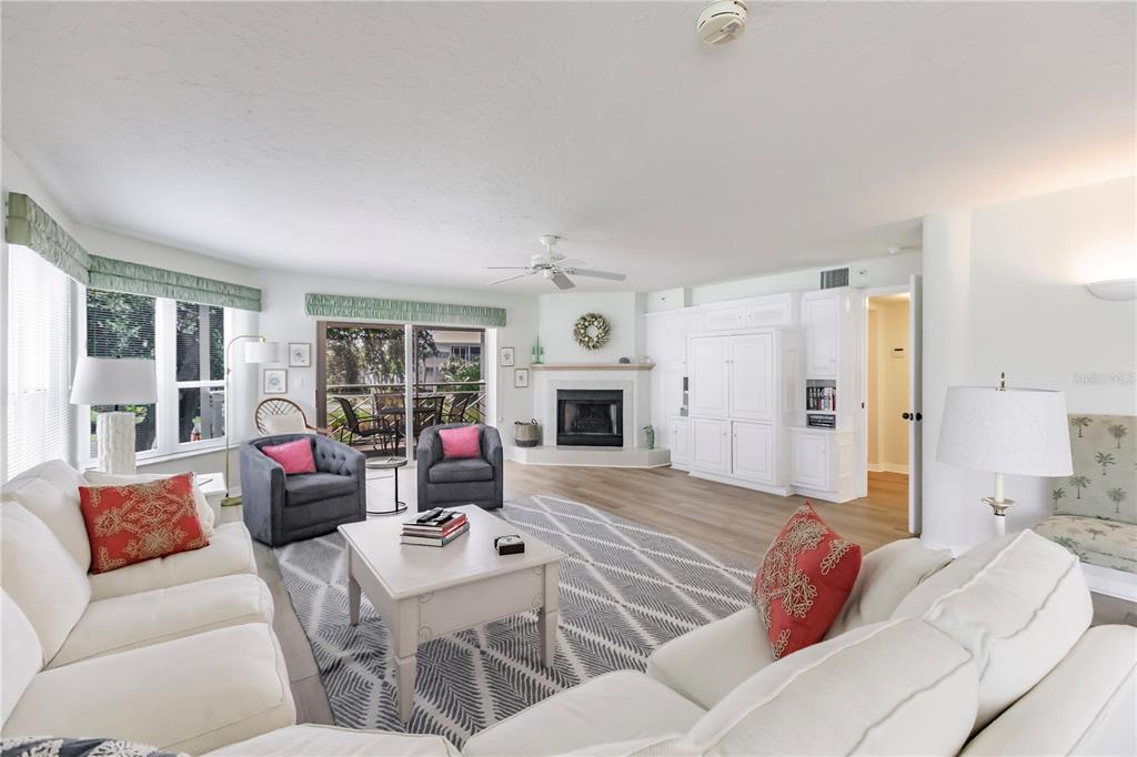 11000 Placida Road, Unit 2201 Placida, FL 33946 - Photo 14 of 43 a living room with furniture and a fireplace