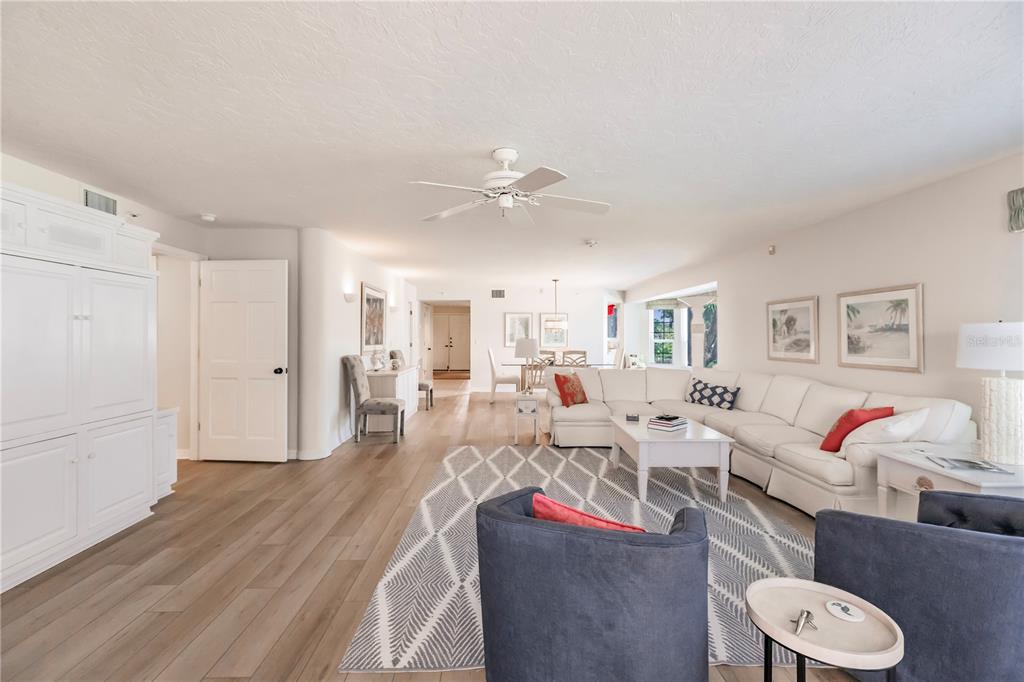 11000 Placida Road, Unit 2201 Placida, FL 33946 - Photo 16 of 43 a living room with lots of furniture and white walls