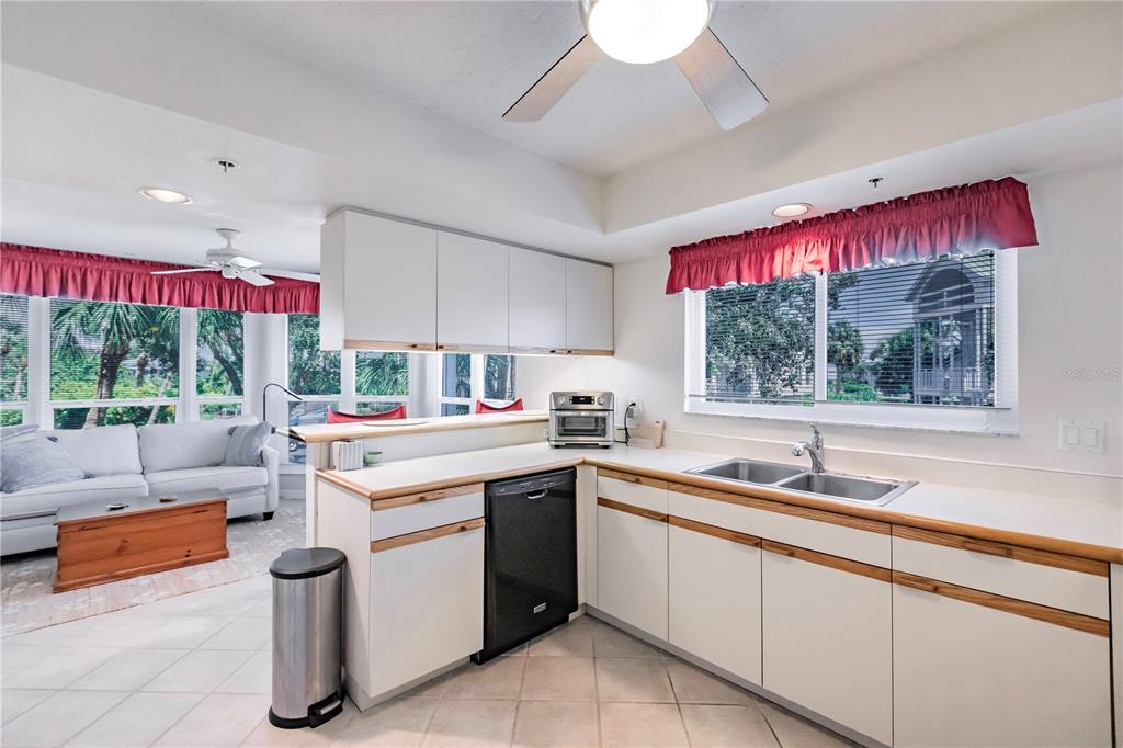 11000 Placida Road, Unit 2201 Placida, FL 33946 - Photo 20 of 43 a kitchen that has a sink and a stove