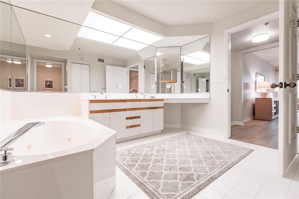 11000 Placida Road, Unit 2201 Placida, FL 33946 - Photo 32 of 43 a large white kitchen with a window and refrigerator