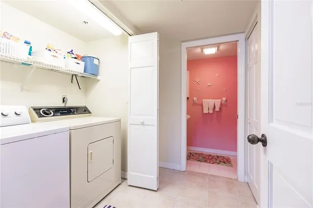 a view of a dining room with furniture large windows and wooden floor