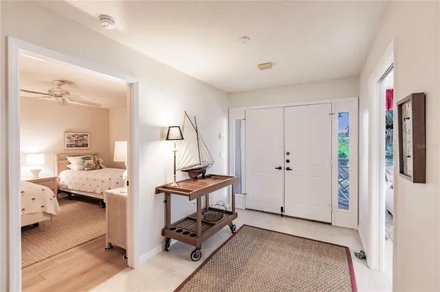 a view of a workspace with furniture and a bedroom