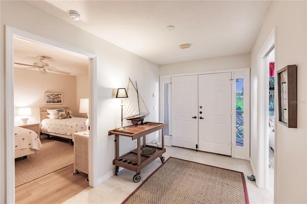 11000 Placida Road, Unit 2201 Placida, FL 33946 - Photo 10 of 43 a view of a workspace with furniture and a bedroom