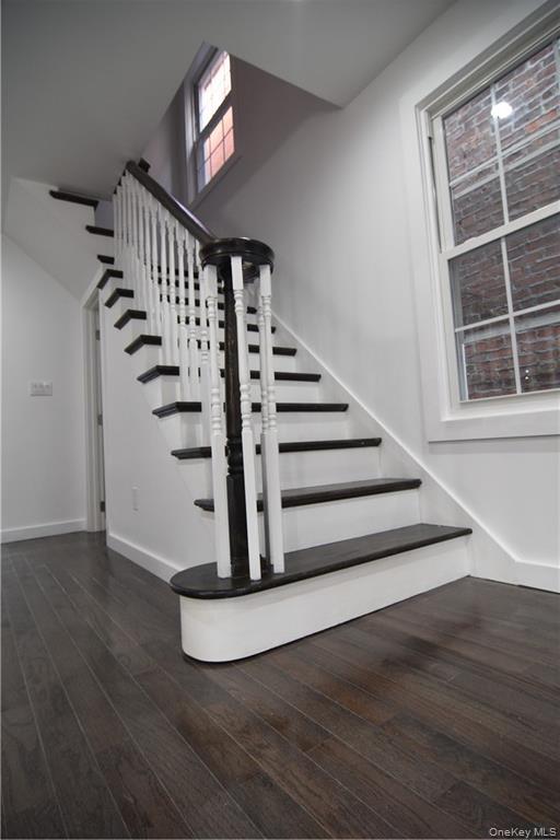 235 East 235th Street Bronx, NY 10470 - Photo 7 of 13 a view of entryway and hall with wooden floor