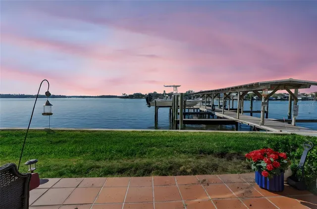 a view of a house with a flower garden