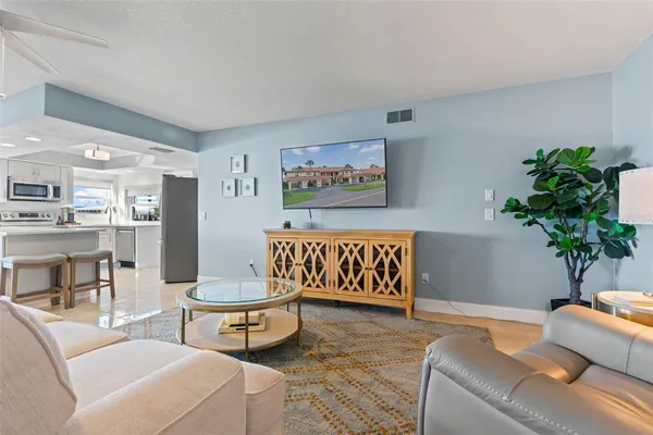 a kitchen with a sink stove and microwave