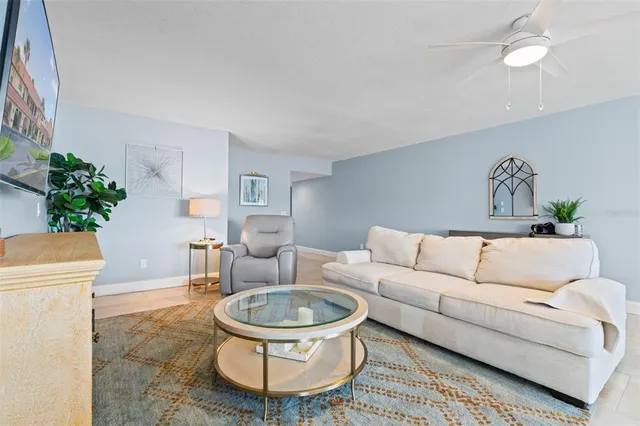 a kitchen with a sink and large window