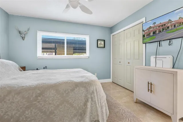 a bathroom with a sink mirror vanity and toilet