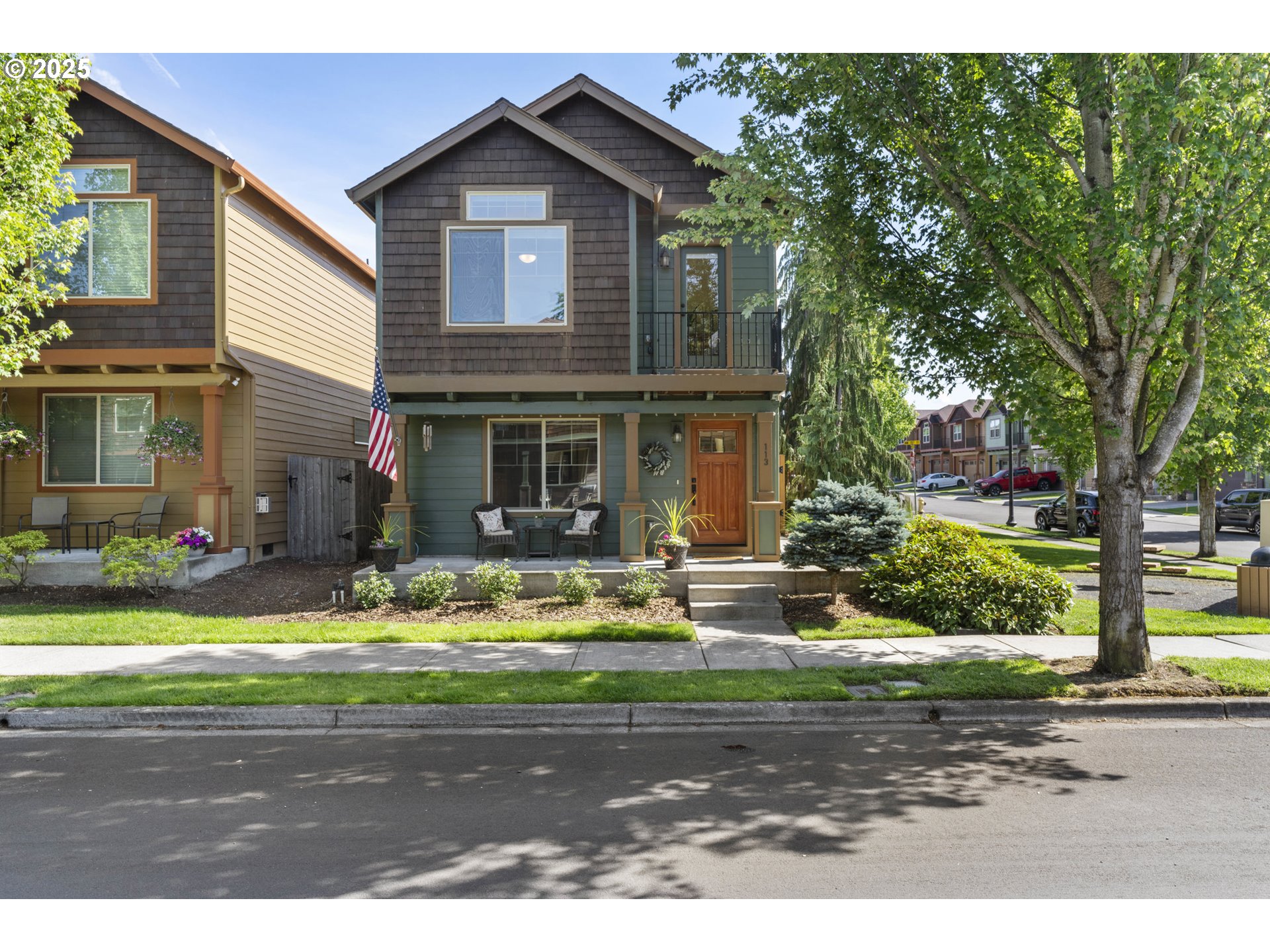113 Northwest 76th Street Vancouver, WA 98665 - Photo 1 of 33 a front view of a house with a yard and garage