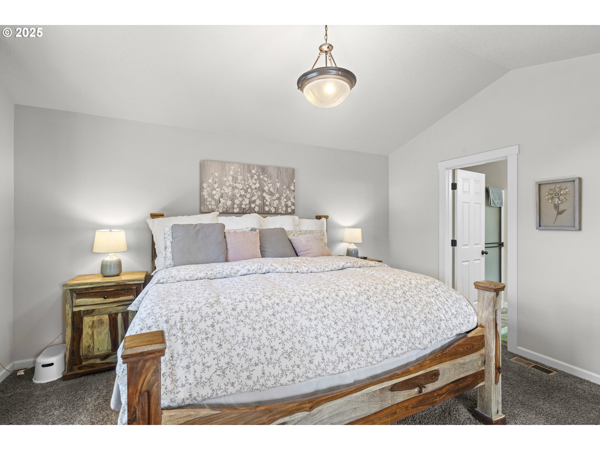 113 Northwest 76th Street Vancouver, WA 98665 - Photo 23 of 33 a bedroom with a bed and a lamp