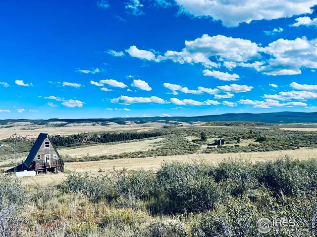 a view of a lake with sunset