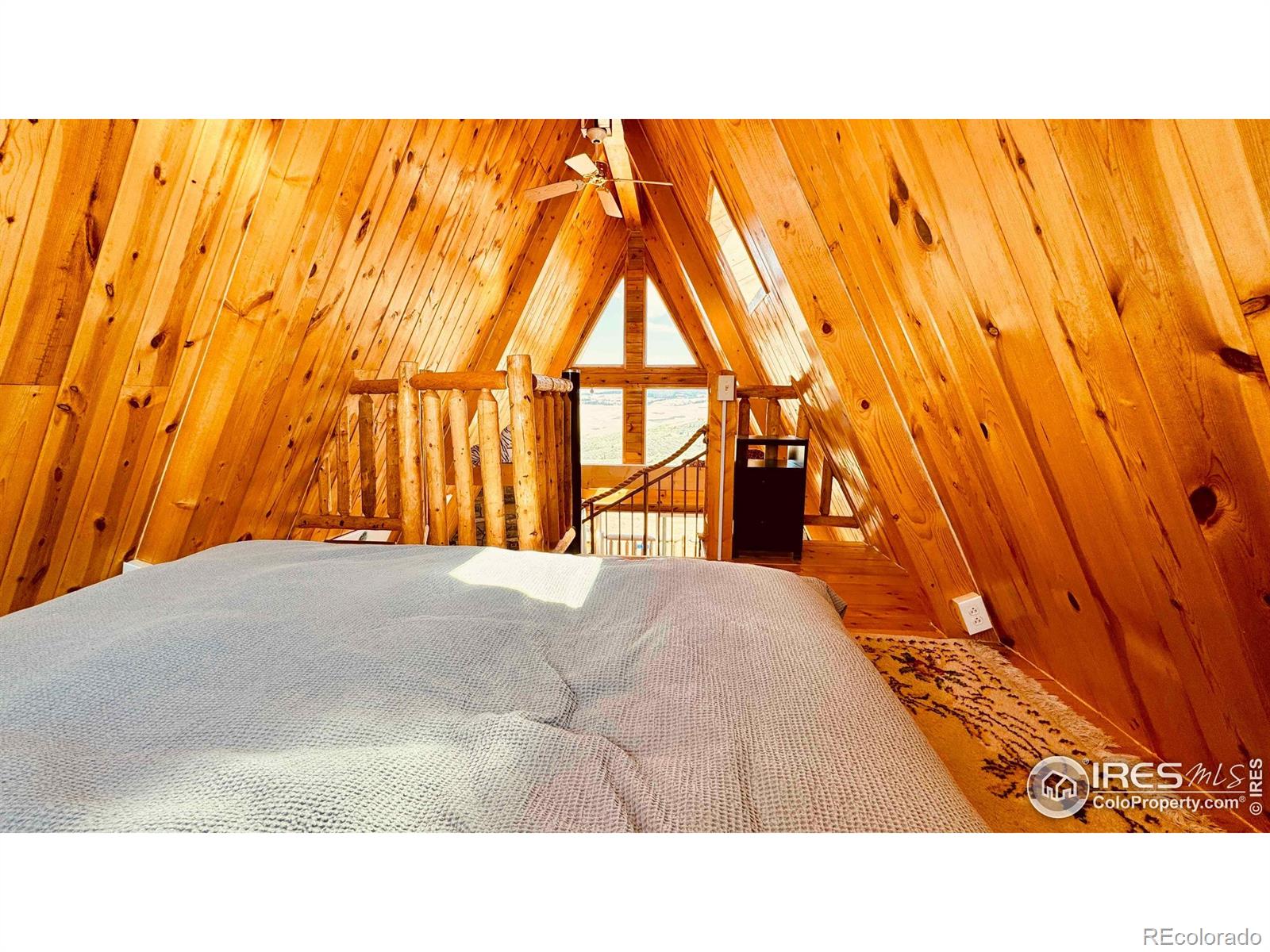 867 Windy Ridge Road Livermore, CO 80536 - Photo 12 of 23 a open area with a small yard