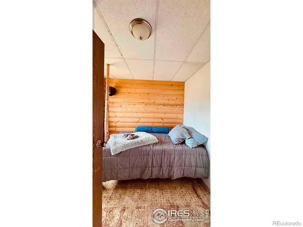 a living room with a rug