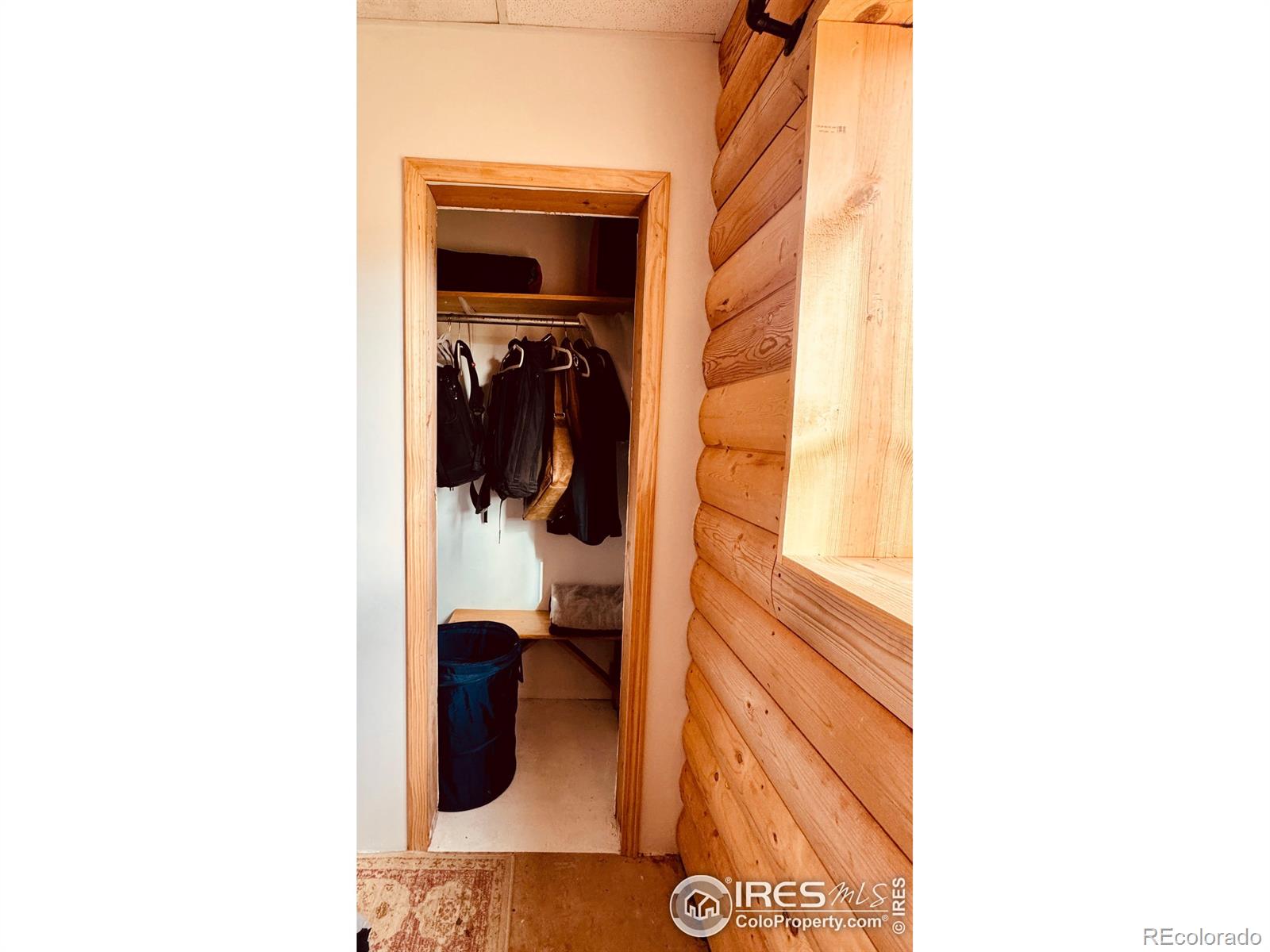 867 Windy Ridge Road Livermore, CO 80536 - Photo 18 of 23 a bathroom with a sink and a mirror