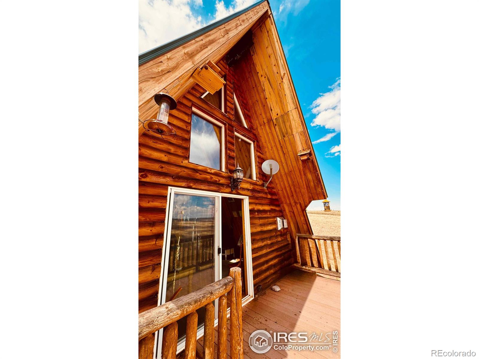 867 Windy Ridge Road Livermore, CO 80536 - Photo 5 of 23 a view of a building with a window