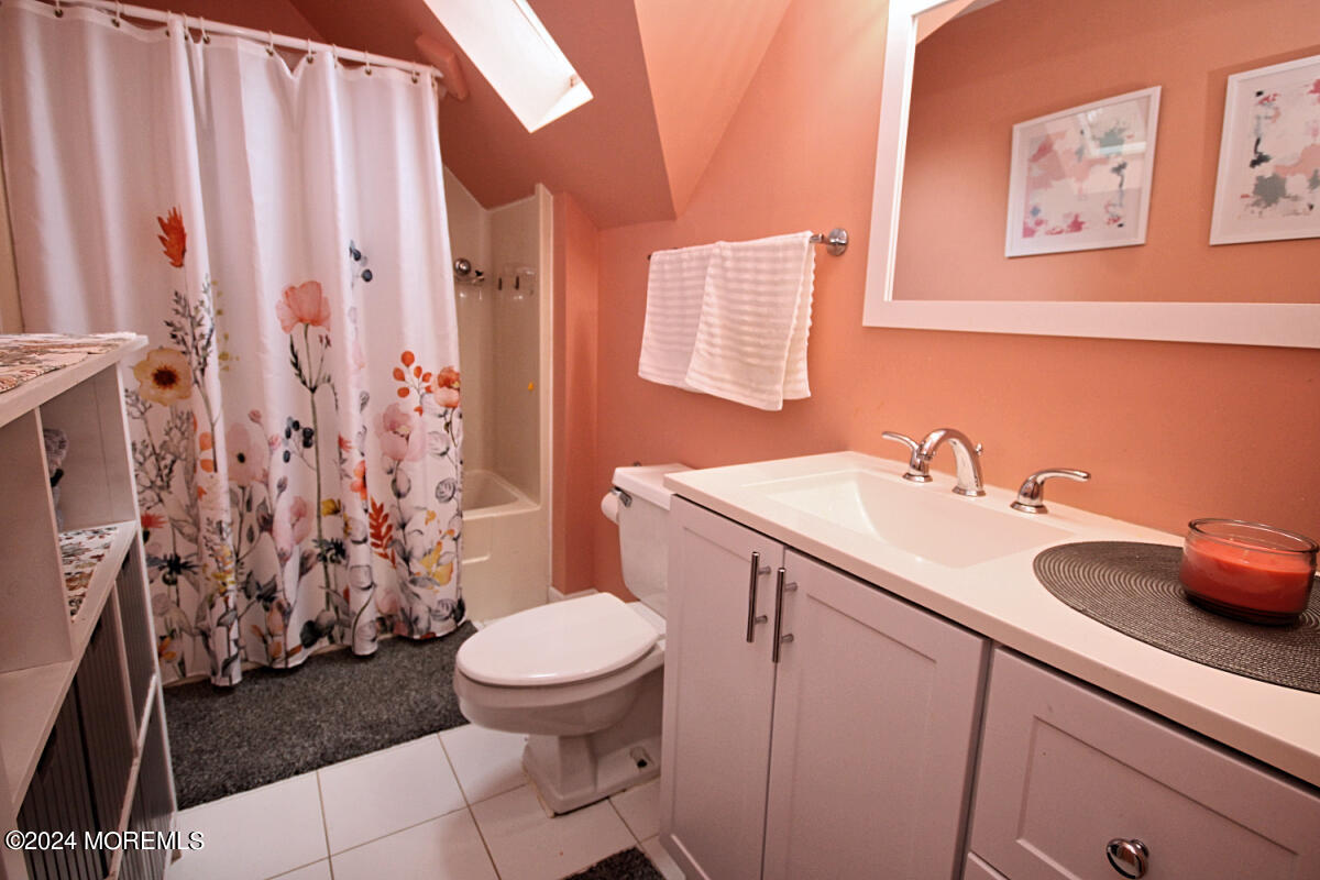 7 Taylor Road Matawan, NJ 07747 - Photo 19 of 33 a bathroom with a sink and a toilet