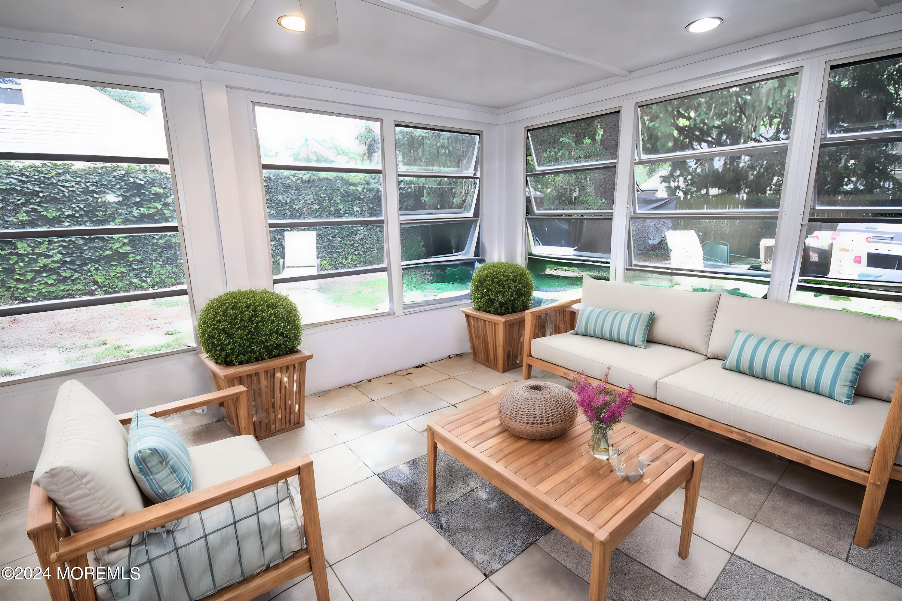 7 Taylor Road Matawan, NJ 07747 - Photo 20 of 33 a living room with furniture and a large window