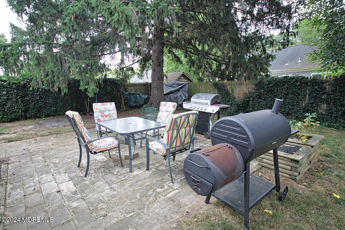 7 Taylor Road Matawan, NJ 07747 - Photo 21 of 33 a view of a patio in the backyard