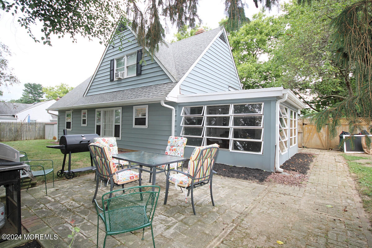 7 Taylor Road Matawan, NJ 07747 - Photo 25 of 33 a view of a house with backyard and sitting area