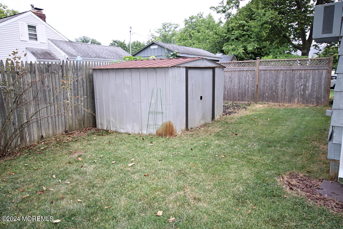 7 Taylor Road Matawan, NJ 07747 - Photo 27 of 33 a view of a backyard with a garden