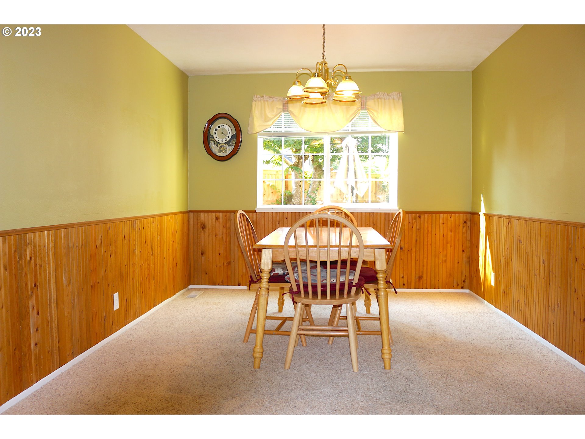 6566 E Street Springfield, OR 97478 - Photo 24 of 46 a view of a dining room with a table and chairs