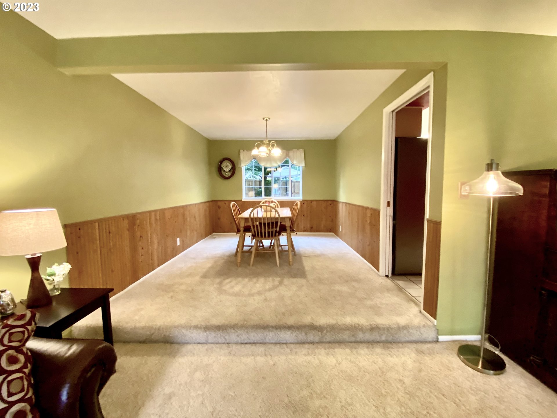 6566 E Street Springfield, OR 97478 - Photo 25 of 46 a view of a living room with a couch and dresser with wooden floor