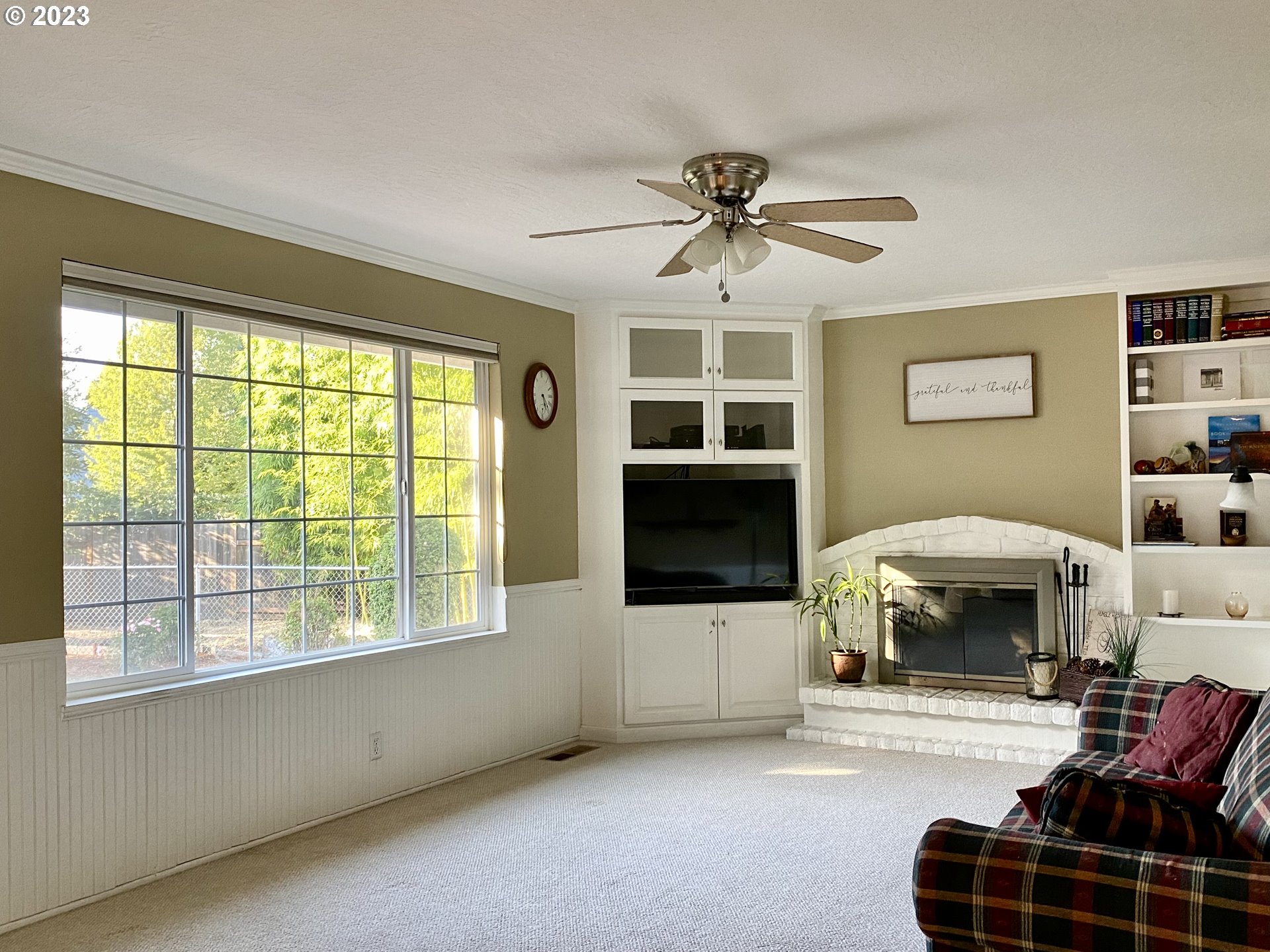 6566 E Street Springfield, OR 97478 - Photo 29 of 46 a living room with furniture and a window