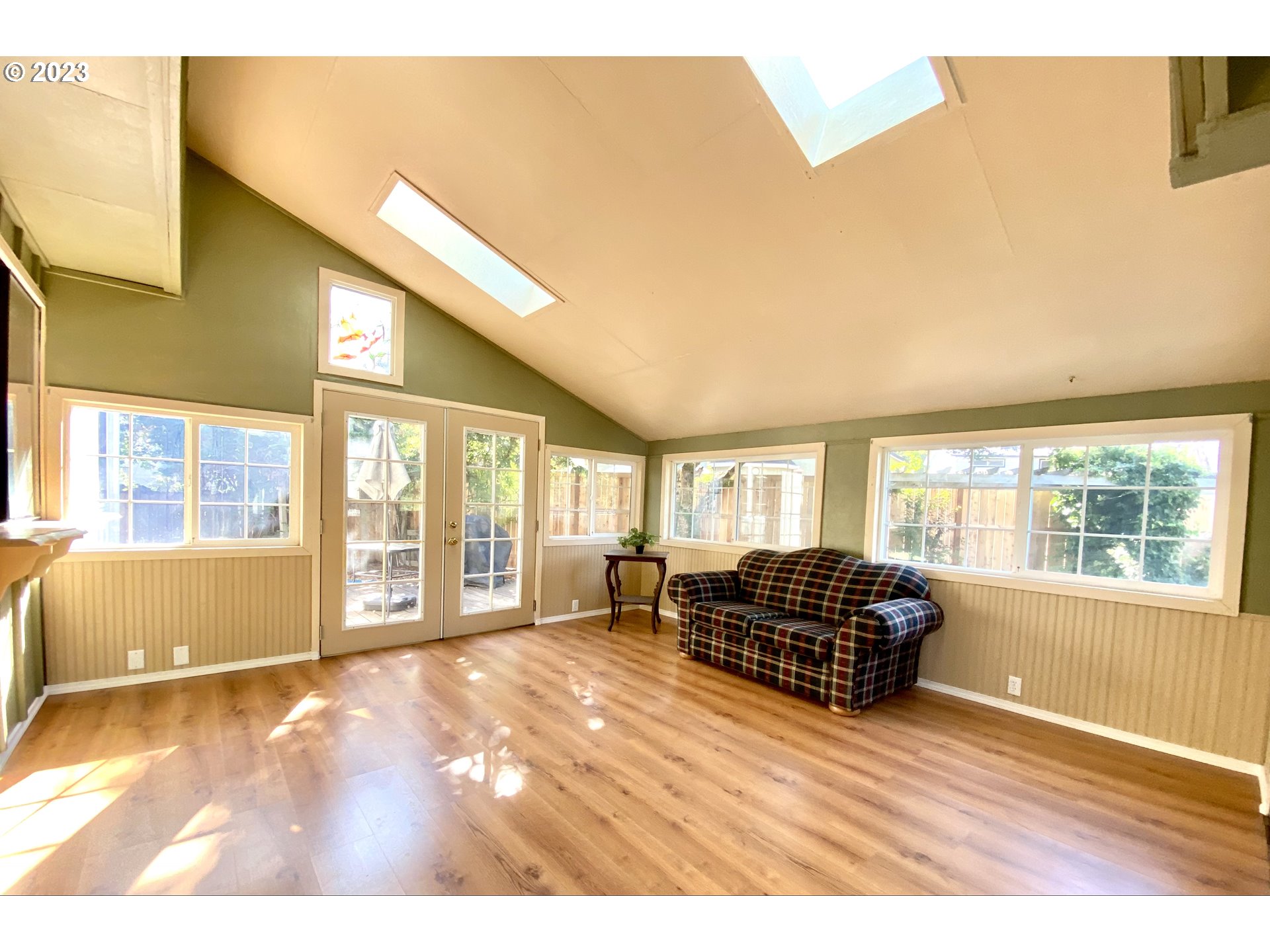 6566 E Street Springfield, OR 97478 - Photo 30 of 46 a living room with furniture and windows