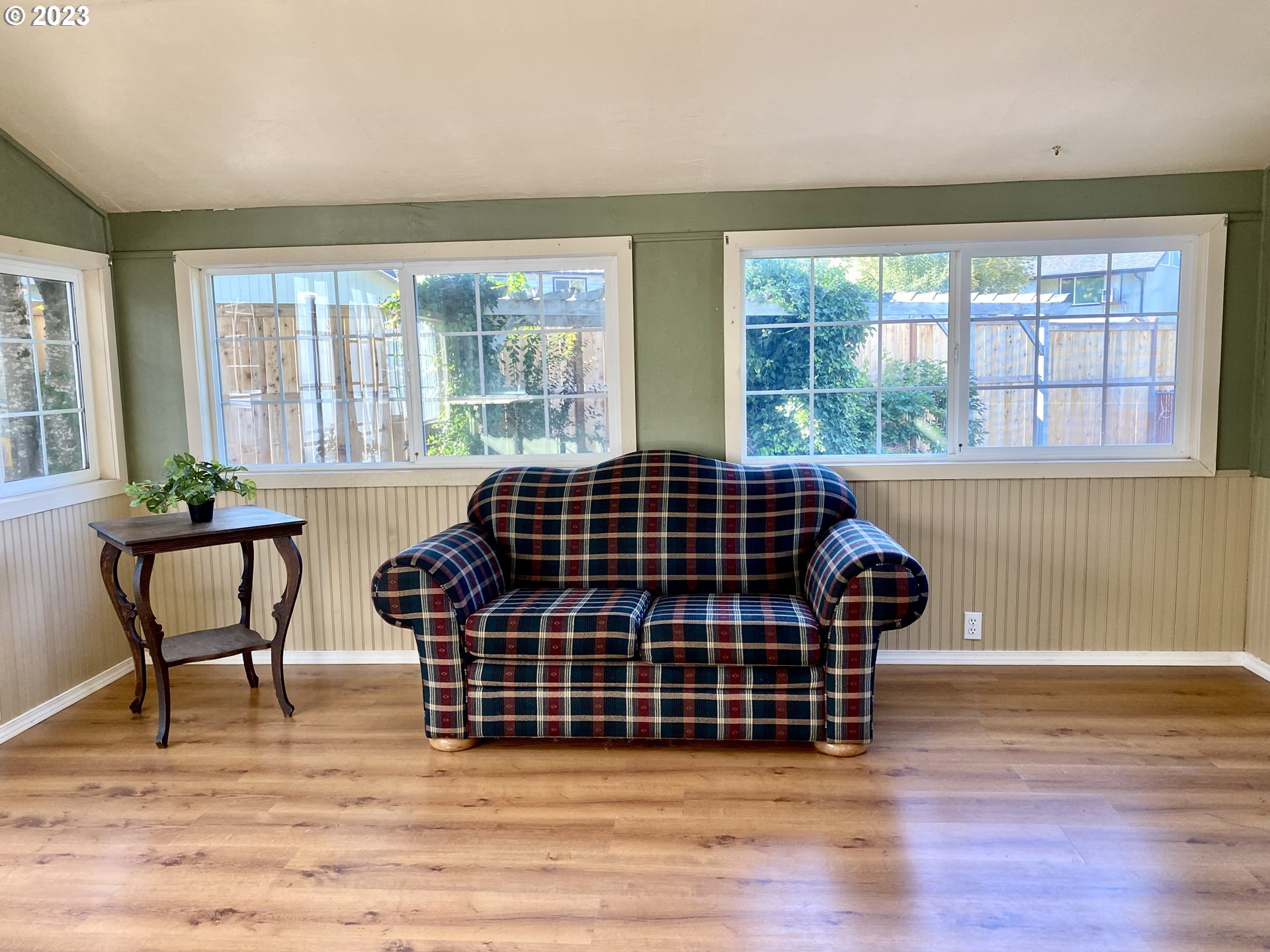 6566 E Street Springfield, OR 97478 - Photo 34 of 46 a living room with a bed furniture and a window