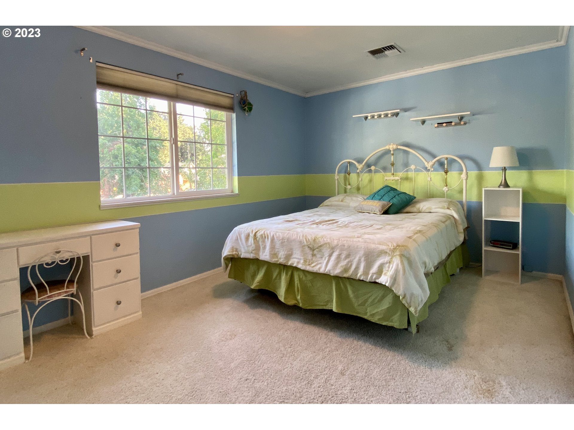 6566 E Street Springfield, OR 97478 - Photo 36 of 46 a bedroom with a bed and a dresser
