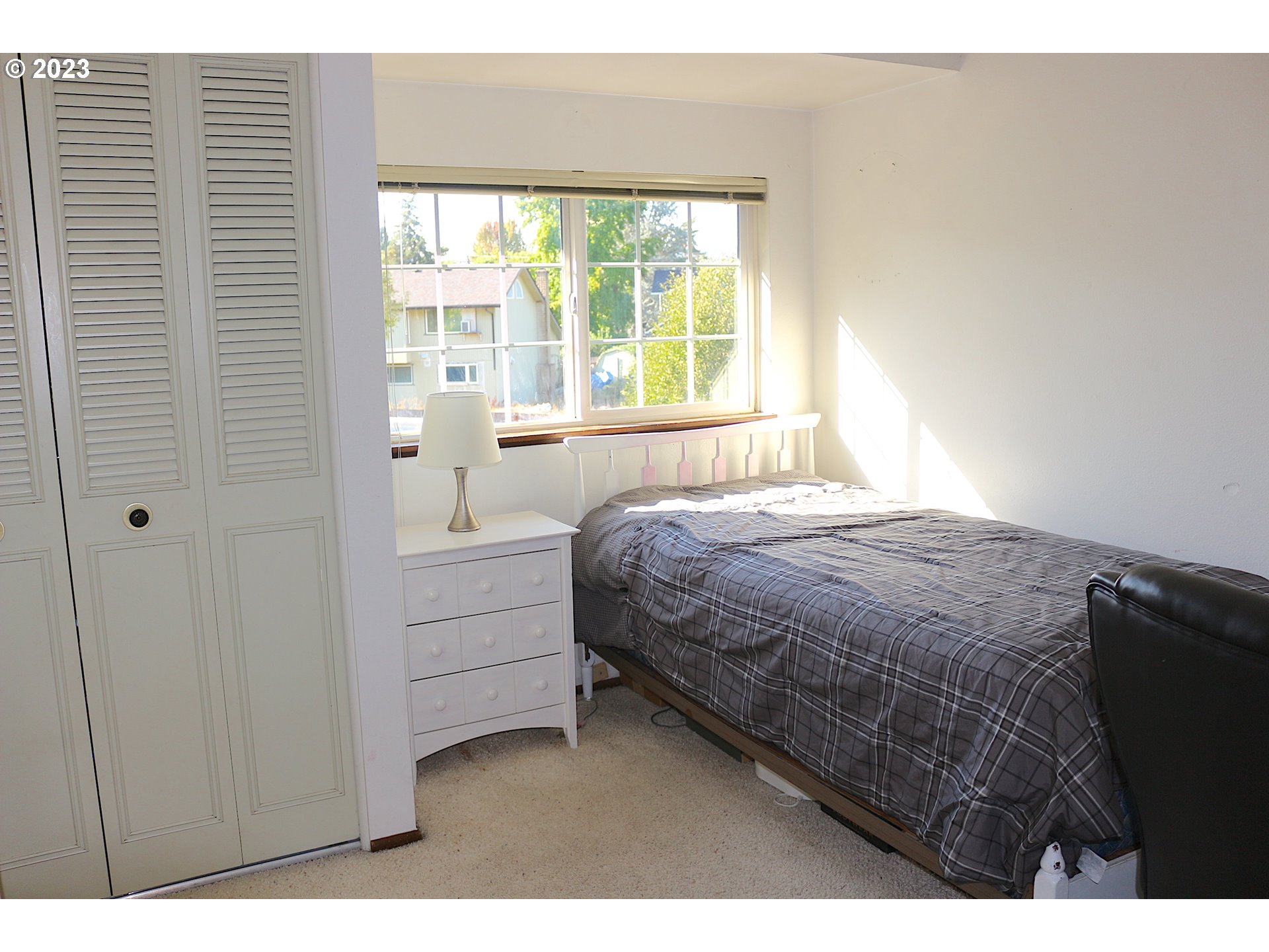 6566 E Street Springfield, OR 97478 - Photo 38 of 46 a bedroom with a bed and a window