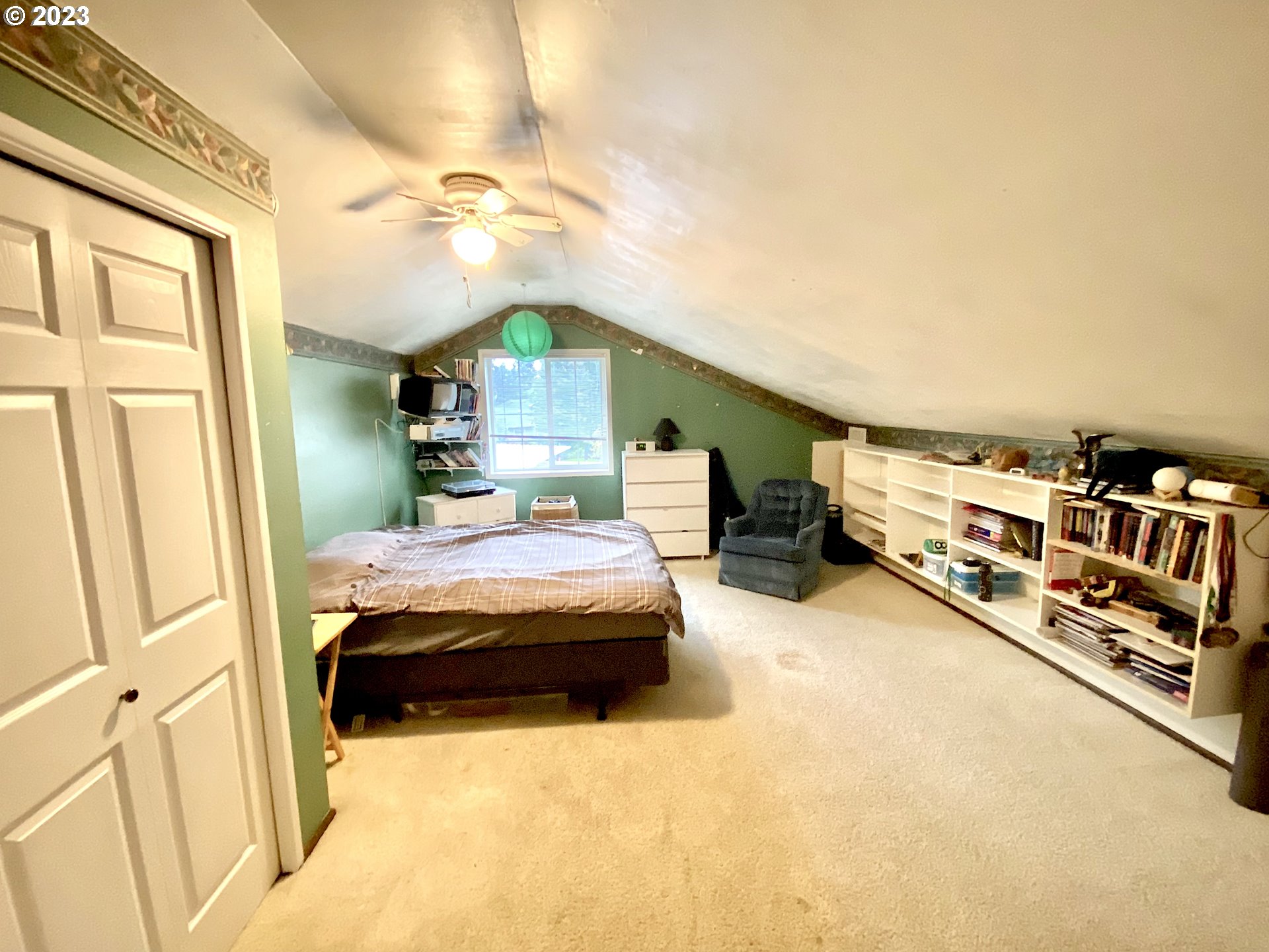 6566 E Street Springfield, OR 97478 - Photo 39 of 46 a bedroom with furniture and a chandelier