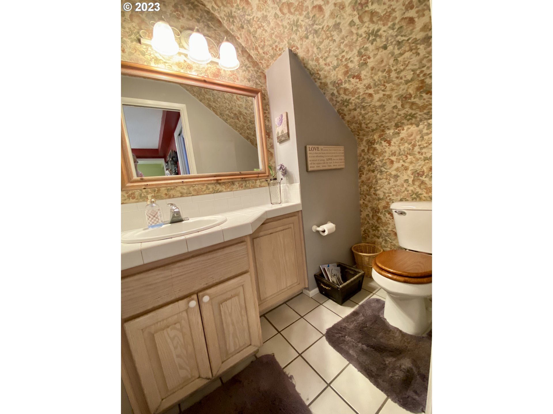 6566 E Street Springfield, OR 97478 - Photo 43 of 46 a bathroom with a sink toilet and mirror