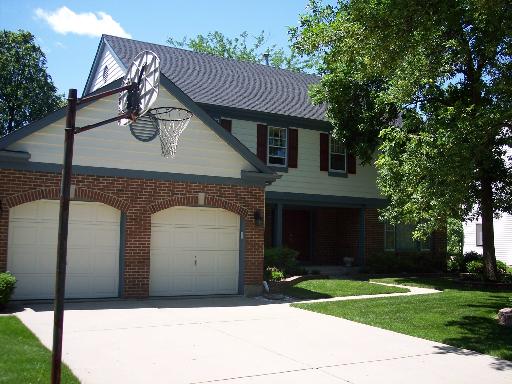 602 Raintree Road Buffalo Grove, IL 60089 - Photo 1 of 1 a front view of a house with garden